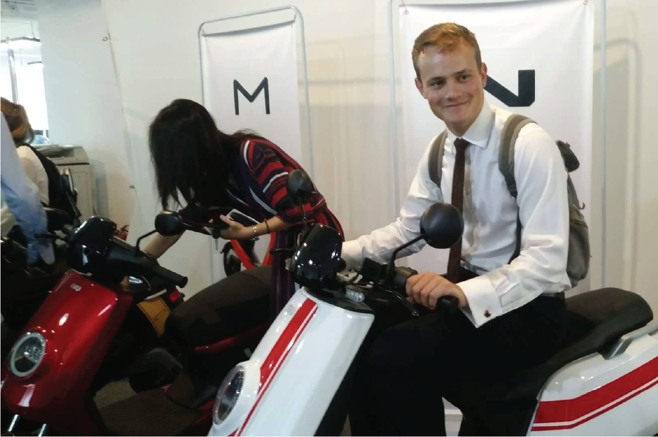 Short Term Programs Abroad student on electric bike